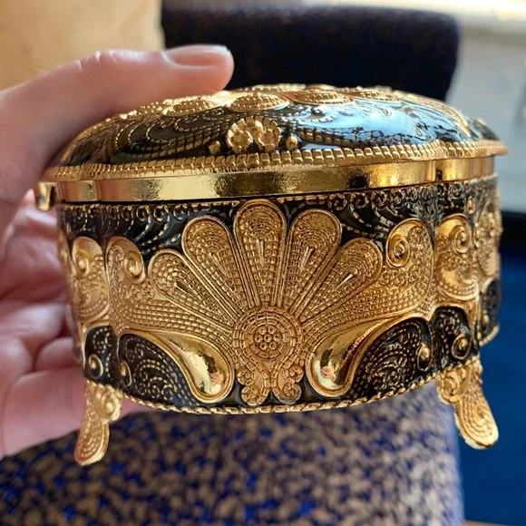 Absolutely stunning jewelry box , golden and black top, made in UAE. Must have!